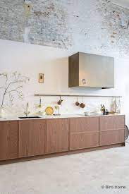 vtwonen keuken in donker eiken met een gouden kraan en marmer look werkblad kitchen style kitchen interior kitchen decor