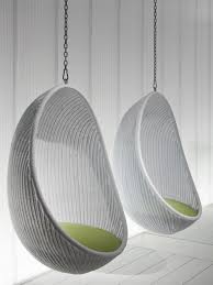 Furniture Nice Looking White Woven Rattan Two Hanging Egg Chair With White Wooden Wall Panels As Hanging Chair Indoor Hanging Egg Chair Hanging Chair Outdoor