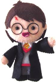 A lion, an eagle, a badger and a snake surrounding a large letter 'h'.. 2