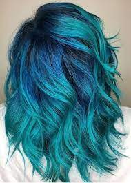 Blue and green hair colors never ceased to amaze us. Teal Hair With Cobalt Roots Hair Styles Teal Hair Color Blue Hair