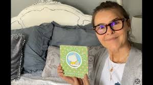 Oma reads “Belly button book”