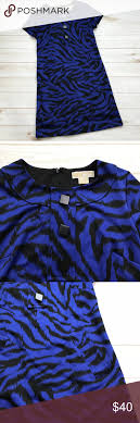 Michael Kors Size 8 Blue Animal Print Dress Michael Kors Size 8 Blue And Black Animal Print Dress Decorative Front Animal Print Dresses Clothes Design Fashion