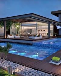 Practical pool house plan designed to match sunbelt and mediterranean style homes features a covered porch, service bar, pull bath, storage closet and party room. 390 Atrium House Ideas In 2021 House Design House Architecture House