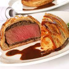A Classic Recipe For Beef Wellington By Chef Gordon Ramsay Served With Sauted Potatoes And Beef Wellington Recipe Beef Wellington Wellington Food
