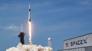 An illustration of spacex's crew dragon space capsule for nasa astronauts launching toward space on a falcon 9 rocket. Isro Congratulates Nasa Spacex On Historic Launch Of Dragon Spacecraft