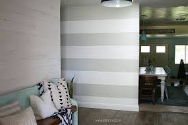 The easiest and most cost effective way to transform your space! Diy Striped Accent Wall With Gray White Stripes Lolly Jane