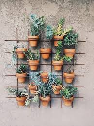 Vertical Gardening Designs Diy Iron Grid Pot Holder Vertical Garden Planters Clever Diy Vertical Gardening Ideas For You Plants Vertical Garden Garden Wall