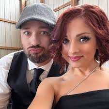 He says with his girl in his profile picture.