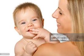 Happy Mother With Baby High-Res Stock Photo