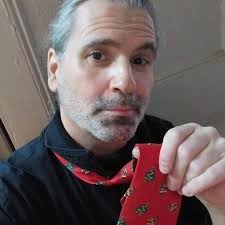 Sartorial Christmas choices. I wore a Christmas tie with Christmas trees  and Santa Claus in the chimney socks. Seen at home and with a tree in Penn  Station after learning my NJ