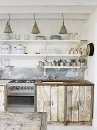 Take A Tour Of The Gorgeous White Cabin In The Village Of Winchelsea A Beach Town I Country Kitchen Designs Kitchen Inspiration Design Rustic Kitchen Cabinets
