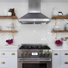 I'm stuck on how to lay my tiles for the backsplash. Large White Herringbone Kitchen Backsplash Tiles Design Ideas Bac Kitchen Backsplash Tile Designs Herringbone Kitchen Backsplash Herringbone Backsplash Kitchen