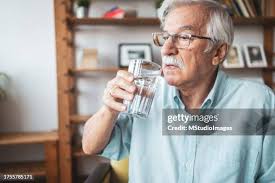 4,878 Senior Drinking Glass Of Water Stock Photos, High-Res Pictures, and  Images