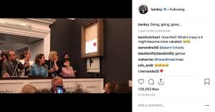 But the shredder built into the frame suddenly stopped halfway through. Banksy Uploads Video On Shredded 1million Painting