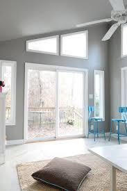 How To Paint Extra High Vaulted Ceilings Young House Love Vaulted Ceiling Living Room Cathedral Ceiling Living Room Ceiling Design Bedroom