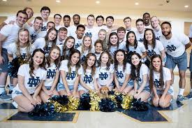 Meet your 2019-2020 Notre Dame Cheerleaders and our smallest and furiest  member, Duncan! ☘️ • • ND Day begins tonight. Don't forget to cast your  votes for cheer!!! https://notredameday.nd.edu/organizations/cheerleading -bb2dd905-c82f-452b-bb74
