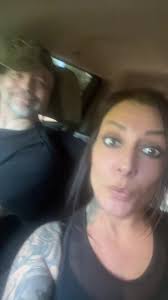 Me and husband playing around while stuck in traffic@Andy Guyton