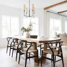 A simple modern palette encompasses the home and is evident in the dining room. 20 Modern Farmhouse Dining Rooms That Will Transport You To The Countryside