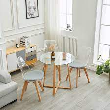 The oval table top is very elegant. Ipotius Modern Glass Round Dining Table 80cm Kitchen Table For Small Spaces With Wood Legs 80x75cm Buy Online In Angola At Angola Desertcart Com Productid 158678254