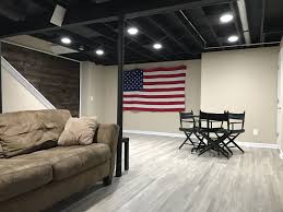 Basement ceilings are often overlooked by homeowners. 20 Stunning Basement Ceiling Ideas Are Completely Overrated Basement Living Rooms Basement Ceiling Low Ceiling Basement