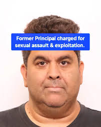 Former principal Jon Paul David Cooper charged with sexual exploitatio...