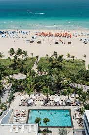 The World S Coolest Hotel Pools Miami Travel South Beach Miami Royal Palm Hotel Miami