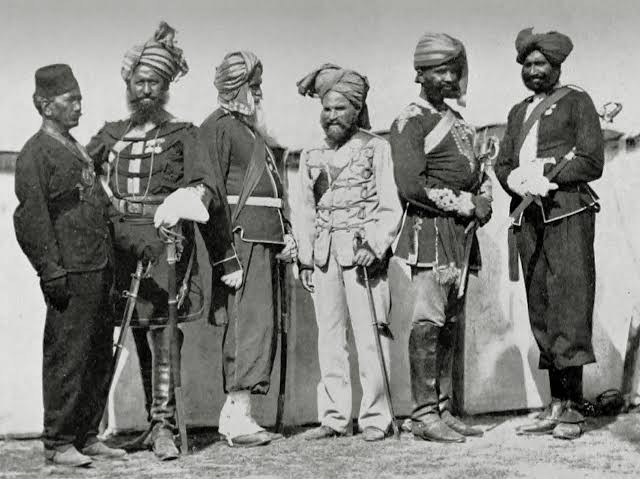 British and Indian Officers of the 18th Punjab Infantry ,Delhi May 1859 Captain J Williamson the Commandent Second From Right