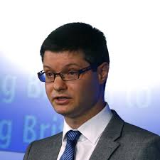 Next slashes CEO Lord Wolfson's pay after profit declines for the first  time in eight years