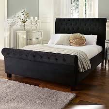 It can support up to 4400lbs. Ophelia Deluxe Upholstered Bed Frame Kaleidoscope