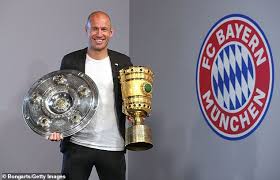 Positions 1, 2, 3, 4: Arjen Robben And Franck Ribery Pose With Bundesliga And German Cup Daily Mail Online