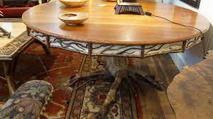 The apron is crafted with a panels of birch bark, twigs, and hand shaped wood art. Lake Placid Dining Table L Post Rustics Adirondack Furniture