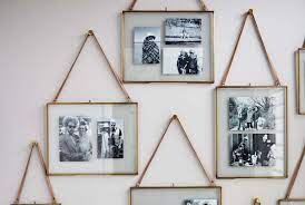 Well, how about creating a cohesive focal point that features photos, art prints, and paintings? The Do S And Don Ts Of Decorating Your Hallways