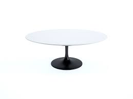 Modernist style white laminate coffee table. Knoll Saarinen Tulip Oval Coffee Table With Black Base And Laminate Top By Eero Saarinen Chaplins
