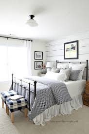 A farmhouse bedroom embraces that feeling of family presence in a home. Gingham And Ticking Farmhouse Style Bedroom Without Spending A Dime Farmhouse Bedroom Decor Home Decor Bedroom Farmhouse Style Master Bedroom