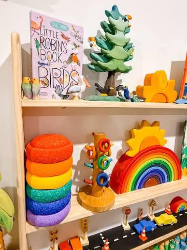 A little rainbow shelf to brighten the rainy weather! #rainbowshelves  #openendedtoys #woodentoysforkids #woodentoys #openendedplay