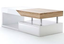 Extendable coffee tables are one such resource, with the ability to function as an ordinary coffee table while disguising the ability to raise to lap height, expand in size or move about on coasters. Modanuvo Hope Modern White Gloss Oak Extending Storage Coffee Table With Drawer Lodge Furniture Uk