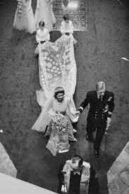 Princess diana's wedding dress designers who created the silk taffeta royal wedding gown. The Queen S Wedding Dress Was Created Using Wartime Ration Coupons Tatler