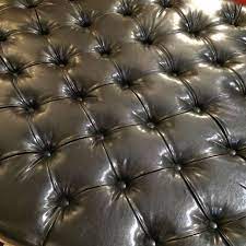 Both types of leather come from a hide's outermost layer, which is the most durable and strongest part. Very Large Button Tufted Black Faux Leather Ottoman Coffee Table For Sale At 1stdibs