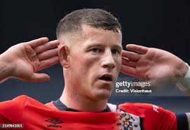 Reece Burke of Luton Town looks