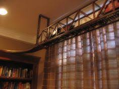 The first step of my ceiling mount train around the living room. 21 Train On Ceiling Ideas Train Model Trains Train Layouts