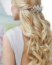Braids, waves, buns, and more—channel your inner rapunzel on the big day by choosing one of these gorgeous bridal hairstyles for long hair. Awesome Wedding Hairstyle On Long Curly Blonde Hair Wedding Hairstyles Wedding Hair Down Wedding Hairstyles For Long Hair