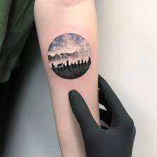 A tattoo by eva krbdk is comprised of lovely, dreamy scenery etched within miniature tattoo circles. Dazzlingly Beautiful Illustration Tattoos Inside Little Circles By Eva Krbdk