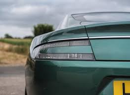 Image result for Almond Green 2010 Aston Martin