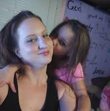 Bubbles keeping her nose warm in slippers