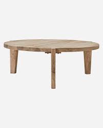 Glenmore walnut medium round wood coffee table with detailed legs. Coffee Table Bali Natural House Doctor
