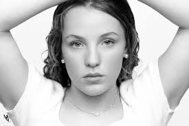 Could someone please make the background neutral and mist the edges  slightly, this is a miracle pregnancy so would like to create a lovely  photo for the nursery...I'm happy with black and