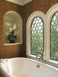 A Pair Of Grilles Installed In A Bathroom Window Setting Window Grill Design Modern Iron Window Grill Faux Iron Window