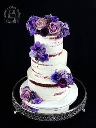 I M In Love With The Colours On This Wedding Cake Shades Of Purple Fresh Flowers To Match Th Wedding Cake Purple Flowers Purple Wedding Cakes Diy Wedding Cake