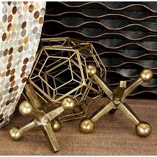 Litton Lane Aluminum Gold Jacks Sculptures Set Of 2 68873 The Home Depot In 2020 Decorative Accessories Carbon Loft Decmode