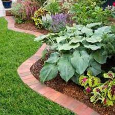How To Edge A Garden Bed With Brick Garden Pavers Brick Garden Edging Garden Edging